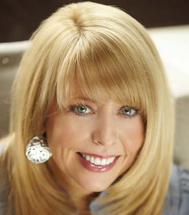 Kristie Mitchell Vice President of Brand and Marketing BISCUITVILLE Fresh Southern®